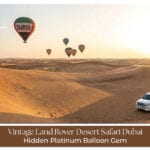 Vintage Land Rover desert safari Dubai dunes